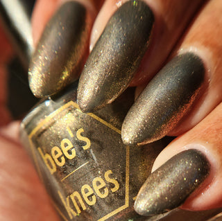 Image provided for Bee's Knees by a paid swatcher featuring the nail polish " Denial "