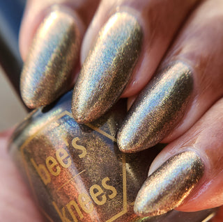 Image provided for Bee's Knees by a paid swatcher featuring the nail polish " Denial "