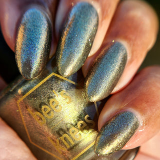 Image provided for Bee's Knees by a paid swatcher featuring the nail polish " Denial "