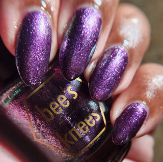 Image provided for Bee's Knees by a paid swatcher featuring the nail polish " Nevermore "