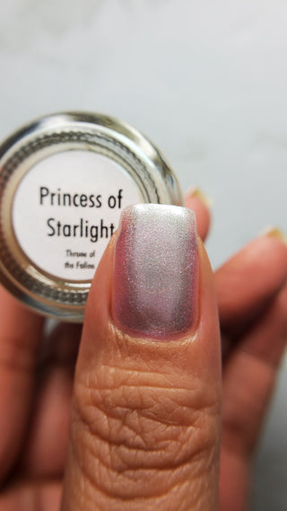 Image provided for Bee's Knees by a paid swatcher featuring the nail polish " Princess of Starlight "