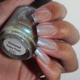 Image provided for Bee's Knees by a paid swatcher featuring the nail polish " Poisoned Fairy Fruit "