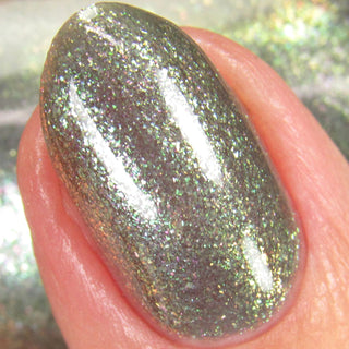 Image provided for Bee's Knees by a paid swatcher featuring the nail polish " Denial "