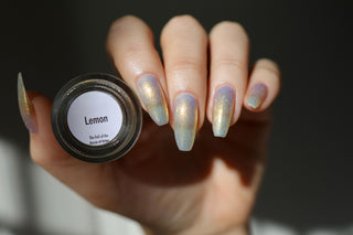 Image provided for Bee's Knees by a paid swatcher featuring the nail polish " Lemon "