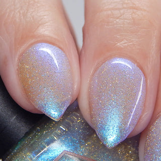 Image provided for Bee's Knees by a paid swatcher featuring the nail polish " Poisoned Fairy Fruit "