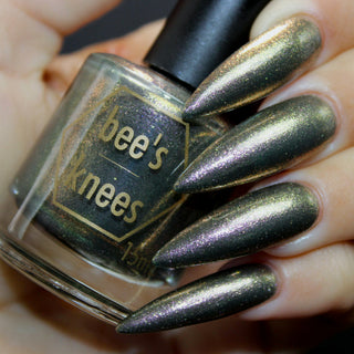 Image provided for Bee's Knees by a paid swatcher featuring the nail polish " Denial "