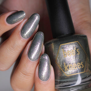 Image provided for Bee's Knees by a paid swatcher featuring the nail polish " Denial "