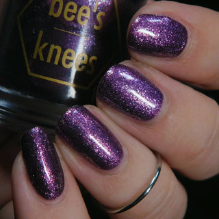 Image provided for Bee's Knees by a paid swatcher featuring the nail polish " Nevermore "