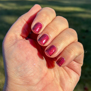 Image provided for Bee's Knees by a paid swatcher featuring the nail polish " Immutable "