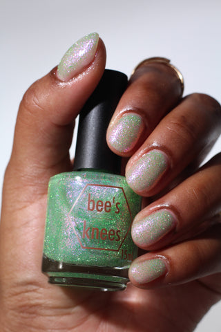 Image provided for Bee's Knees by a paid swatcher featuring the nail polish " Take Up Knitting "