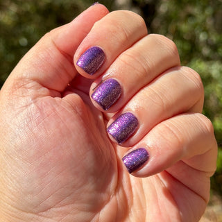 Image provided for Bee's Knees by a paid swatcher featuring the nail polish " Nevermore "