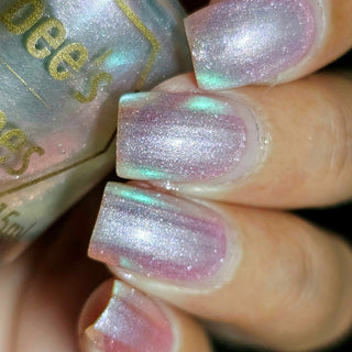 Image provided for Bee's Knees by a paid swatcher featuring the nail polish " Princess of Starlight "