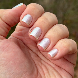 Image provided for Bee's Knees by a paid swatcher featuring the nail polish " Princess of Starlight "