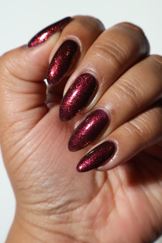 Image provided for Bee's Knees by a paid swatcher featuring the nail polish " Immutable "