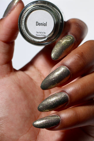 Image provided for Bee's Knees by a paid swatcher featuring the nail polish " Denial "