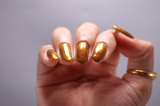 Image provided for Bee's Knees by a paid swatcher featuring the nail polish " I Went to Hell For You "