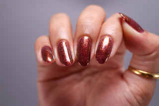 Image provided for Bee's Knees by a paid swatcher featuring the nail polish " Immutable "