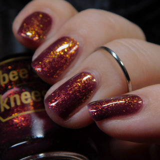 Image provided for Bee's Knees by a paid swatcher featuring the nail polish " Immutable "