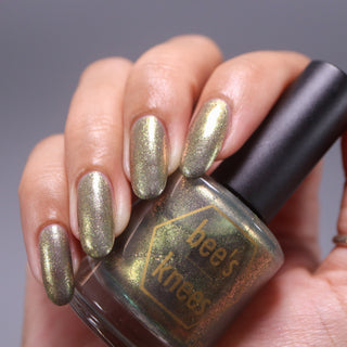 Image provided for Bee's Knees by a paid swatcher featuring the nail polish " Denial "