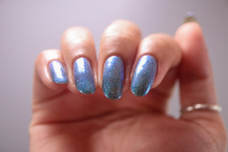 Image provided for Bee's Knees by a paid swatcher featuring the nail polish " Mind the Mist "