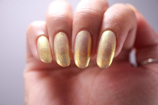 Image provided for Bee's Knees by a paid swatcher featuring the nail polish " Lemon "