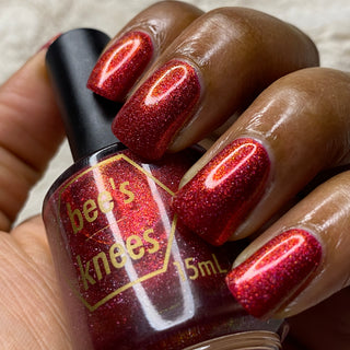 Image provided for Bee's Knees by a paid swatcher featuring the nail polish " Happy Hunting "