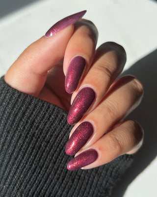 Image provided for Bee's Knees by a paid swatcher featuring the nail polish " Immutable "