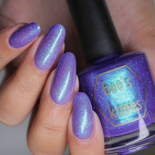 Image provided for Bee's Knees by a paid swatcher featuring the nail polish " Secrets "