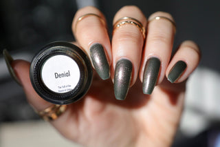 Image provided for Bee's Knees by a paid swatcher featuring the nail polish " Denial "