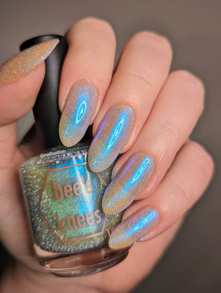 Image provided for Bee's Knees by a paid swatcher featuring the nail polish " Poisoned Fairy Fruit "