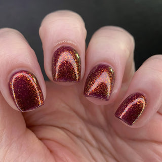 Image provided for Bee's Knees by a paid swatcher featuring the nail polish " Immutable "