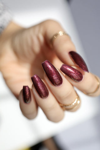 Image provided for Bee's Knees by a paid swatcher featuring the nail polish " Immutable "