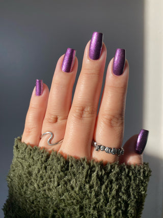 Image provided for Bee's Knees by a paid swatcher featuring the nail polish " Nevermore "