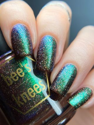 Image provided for Bee's Knees by a paid swatcher featuring the nail polish " God of Idiocy "