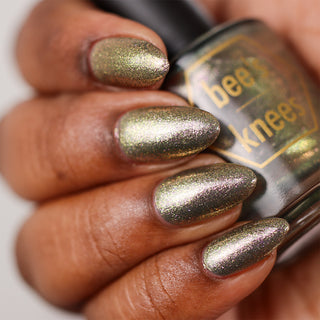 Image provided for Bee's Knees by a paid swatcher featuring the nail polish " Denial "