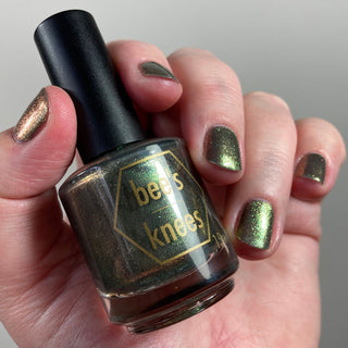 Image provided for Bee's Knees by a paid swatcher featuring the nail polish " Denial "