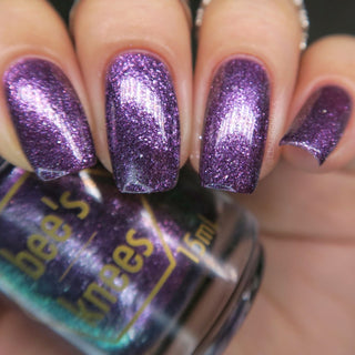 Image provided for Bee's Knees by a paid swatcher featuring the nail polish " Nevermore "