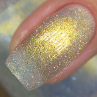 Image provided for Bee's Knees by a paid swatcher featuring the nail polish " Lemon "